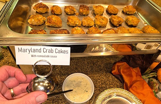 Maryland Crab Cakes in a metal food container catered by A Catered Affair