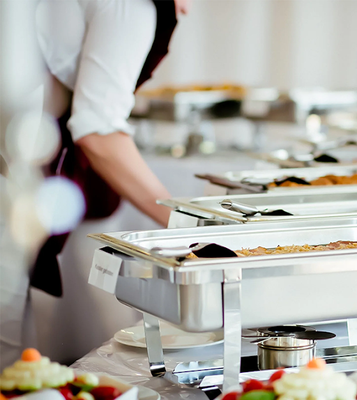 Metal food containers for an event catered by A Catered Affair